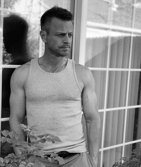 Carmine Giovinazzo poses for a picture for Insta post.